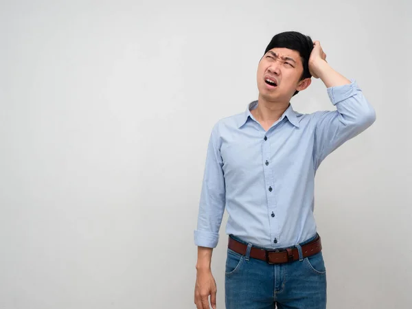 stock image Asian businessman blue shirt hold his head feels headache and strain tried from working isolated