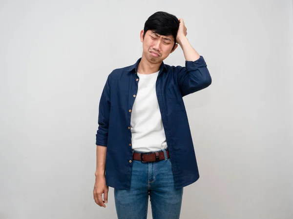 Depressed asian man feels sad gesture hold his head isolated