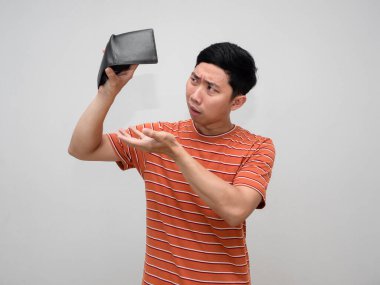 Asian man orange striped feels sad with no money in wallet isolated,Poor man unhappy about not enought money