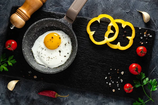 stock image Complete Fry Egg Breakfast with Vegetables and spices. Top view.