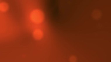 Bulanık dairesel şekillere sahip turuncu eğimli arkaplan canlı ve soyut. Modern görünüm için sosyal medya paylaşımları veya web sitesi afişleri için ideal.