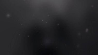 siyah gri arkaplan küçük parlak parçacıkları hafifçe parlaklaştırır