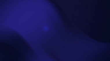 Koyu mavi arkaplan hafifçe dönen zayıf ışık noktalarına sahip