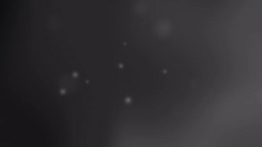 Tasarımlara veya sunumlara gizemli veya ince bir doku eklemek için uygun soluk beyaz bulanık benekleri olan siyah gri arkaplan