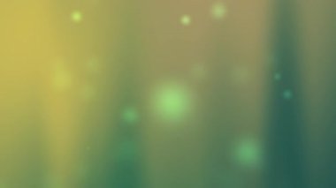 Zarif yeşil ve sarı eğimli arka plan ve huzurlu Ramazan atmosferlerini temsil eden parlak ışık noktaları Ramazan kutlamaları için ideal şenlik olayları veya İslam tasarımları