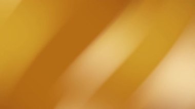 Yumuşak köşegen ışık yansımalarına sahip altın kahverengi soyut bir gradyan. Lüks markalaşma davetleri için idealdir. Yeni yıl Şükran Günü ve reklam ve grafik tasarım için zarif arka planlar.