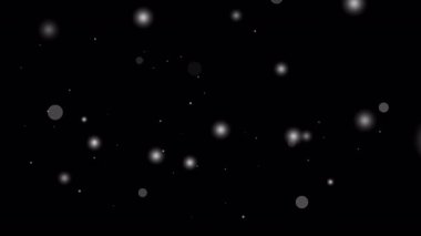 Beyaz parlayan daireler ve parçacıklar şeffaf alfa arkaplan üzerinde mükemmel Noel tasarımı için sihirli kar yağışı sahneleri ve zarif kutlama videoları örtüyor