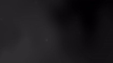 Küresel bayram posterleri, lüks afişler veya zarif teknoloji sunumları için mükemmel yüzen toz parçacıklarına sahip koyu siyah eğimli arkaplan