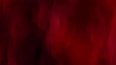 Küçük kırmızı kıvılcımlı kırmızı duman arka planı soyut tasarımlar için mükemmel bayram temalı grafikler ve canlı dijital sanat eserleri