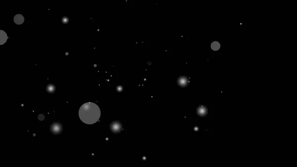 Beyaz parçacık örtüsü siyah arkaplan üzerinde parlayan daireler oluşturur