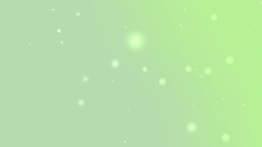 Yüzen parçacıklar ve bokeh ışıkları ile yumuşak yeşil gradyan bayram kutlamaları için idealdir. Doğa, sakinleştirici soyut temalı markalaştırıcı veya zarif dijital tasarımlar tasarlamaktadır.
