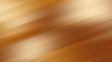 Çapraz ışık çizgileri ve hareket bulanıklığı ile sıcak altın soyut arka plan zengin ve zarif tonlar yeni yıl düğün davetiyeleri ve şenlikli tasarımlar için lüks bir his yaratır.