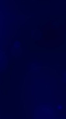 Ağ tasarımı için ideal ışık çemberlerinin oluşturduğu soyut mavi eğimli dikey arkaplan sosyal medya paylaşımları ve sanatsal projeler