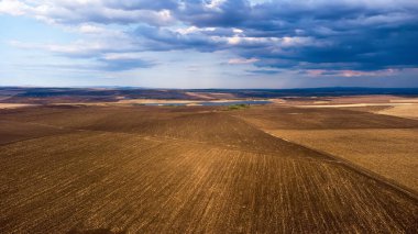 Beautiful aerial panoramic view of autumn countryside landscape. Agricultural fields near Karnobat, Bulgaria.