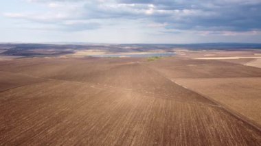 Beautiful aerial panoramic view of autumn countryside landscape. Agricultural fields near Karnobat, Bulgaria