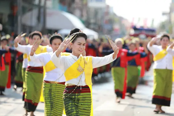 stock image Lampang, Thailand, April 13, 2024: Performers with beautiful females and Hansom male actors in traditional costume in Lanna style take part in a Songkran parade to celebrate the Salung Luang Klong Yai Festival