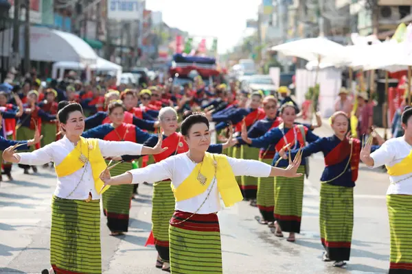 stock image Lampang, Thailand, April 13, 2024: Performers with beautiful females and Hansom male actors in traditional costume in Lanna style take part in a Songkran parade to celebrate the Salung Luang Klong Yai Festival