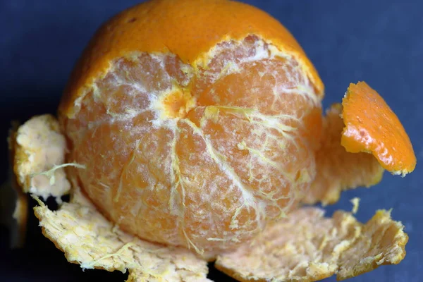 Orange peeled skin on a texture background