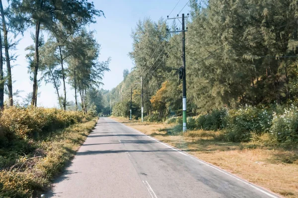 stock image Beautiful road and Zhou forest on the side of the mountain. natural scenery.