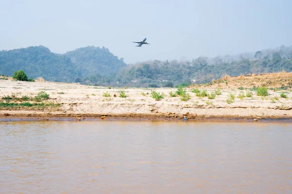 A plan flying over the River, Sylhet, Bangladesh.