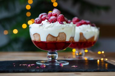 Raspberry trifle with fruit jelly, custard and cream