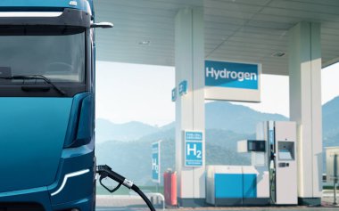 Futuristic hydrogen fuel cell truck next to filling station. Eco-friendly commercial vehicle concept clipart