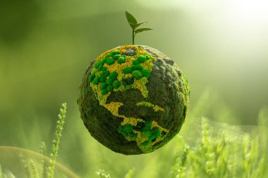 Green planet Earth from natural moss with plant. Symbol of sustainable development and renewable energy clipart