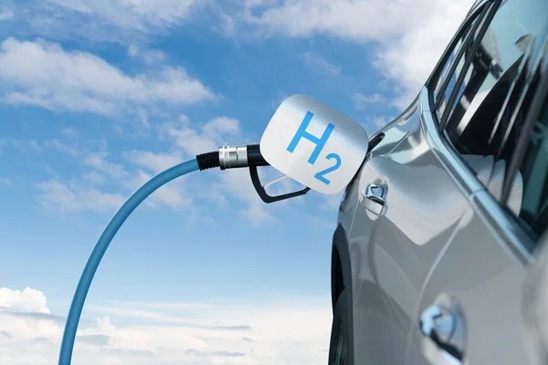 Fuel cell car with connected hydrogen fueling nozzle on a background of blue sky