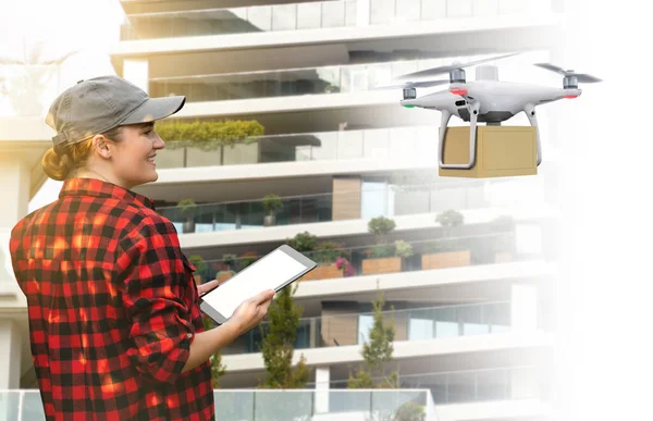 Woman Worker Holding Tablet Controlling Delivery Drone Concept — 图库照片
