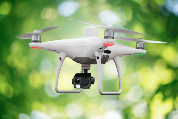 Drone with camera on a green background