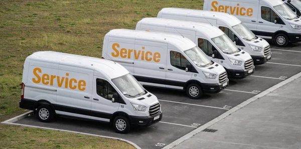 Vans Parked Row Commercial Fleet High Quality Photo — Stock Photo, Image