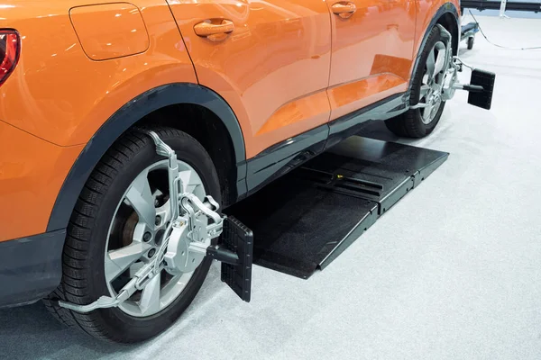 stock image Wheel alignment in car service. High quality photo