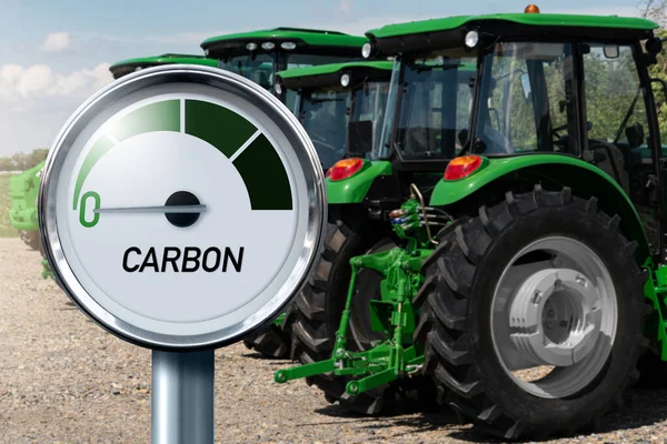 Wskaźnik Napisem Carbon Strzałka Wskazuje Zero Tle Ciągników Rolniczych Wysokiej — Zdjęcie stockowe