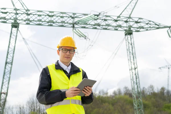 Engineer Digital Tablet Background Power Line Tower High Quality Photo — Stock Photo, Image