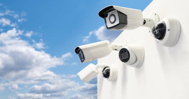 Surveillance cameras on a background of blue sky. Perimeter security. High quality photo clipart