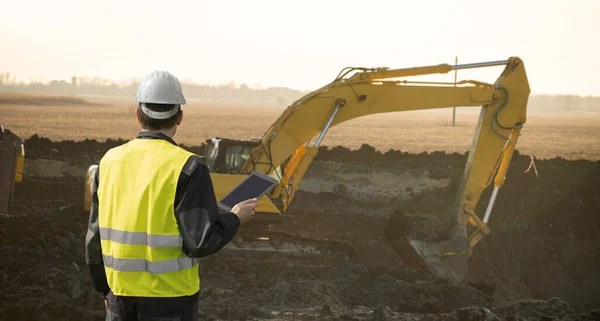 Engineer Helmet Digital Tablet Next Construction Excavator High Quality Photo — Stock Photo, Image