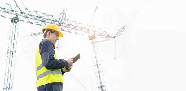 Engineer Digital Tablet Background Power Line Tower High Quality Photo — Stock Photo, Image