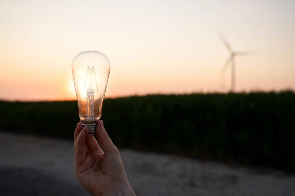 Close Electric Lamp Hand Backgoriun Sunset Renewable Energy Symbol — Stock Photo, Image