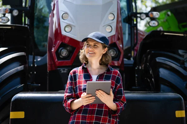 Woman Farmer Digital Tablet Background Agricultural Tractor —  Fotos de Stock