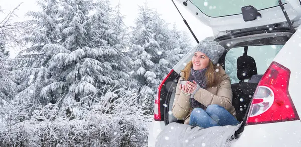 Woman Woolen Hat Sits Trunk Car Holds Cup Hot Tea — Stock Photo, Image