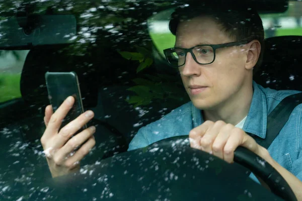 Male Driver Sits Car Looks Smartphone Screen — Stock Photo, Image