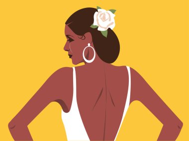 Saçında çiçekler olan, büyük folklorik küpeler takan güzel İspanyol kadın portresi..