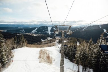 A beautiful view of the mountains from the funicular, but which skiers climb.