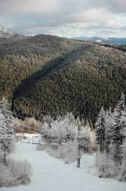 A beautiful view of the mountains from the funicular, but which skiers climb.