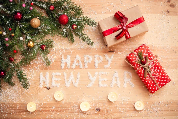 Concept Christmas Happy New Year Inscription Wooden Table Some Branches — Stock Photo, Image