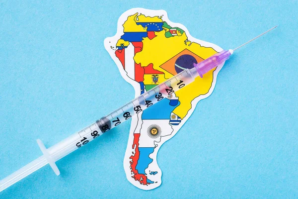 Successful vaccination in South America\'s countries. Syringe on map of South America continent