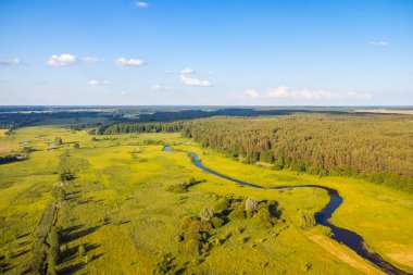 Aerial landscape of valley of the river in countryside. Calm evening over small river in Ukraine
