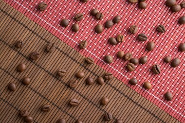Roasted coffee beans in two different backgrounds