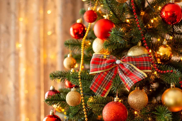 Christmas Tree Big Bow Baubles Foreground Everything Red Golden Colours — Stockfoto