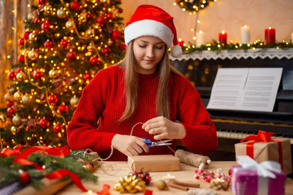 Cheerful Pretty Young Woman Wrapping Christmas Present Happy Holidays Time — 스톡 사진
